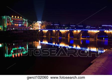Arch bridge lit up at night, Tunxi District, Huangshan, Anhui Province, China View Large Photo Image Stock Image - Arch bridge lit up at night, Tunxi District, Huangshan, Anhui Province, China. Fotosearch