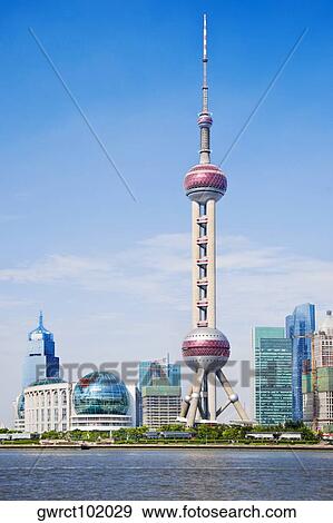 Buildings at the waterfront, Oriental Pearl Tower, Shanghai, China View Large Photo Image Stock Photo - Buildings at the waterfront, Oriental Pearl Tower, Shanghai, China. Fotosearch