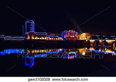 Stock Photo - Buildings lit up at night, Tunxi District, Anhui Province, China. Fotosearch