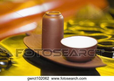 Close-up of a glass and a bowl on a tray, Hefei, Anhui Province, China View Large Photo Image Stock Image - Close-up of a glass and a bowl on a tray, Hefei, Anhui Province, China. Fotosearch