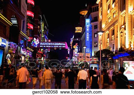 Group of people walking in a street, Nanjing Road, Shanghai, China View Large Photo Image Stock Photo - Group of people walking in a street, Nanjing Road, Shanghai, China. Fotosearch