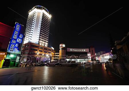 Low angle view of buildings lit up at night, Hefei, Anhui, China View Large Photo Image Stock Photograph - Low angle view of buildings lit up at night, Hefei, Anhui, China. Fotosearch
