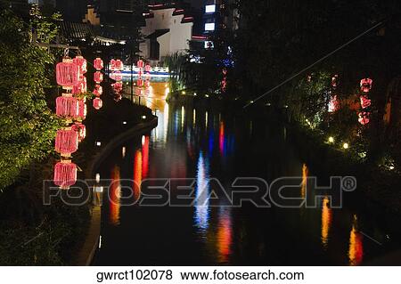 Stock Photo - Reflection of Chinese lanterns in water, Nanjing, Jiangsu Province, China. Fotosearch