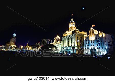Picture - Buildings lit up at night, Lujiazui, The Bund, Shanghai, China. Fotosearch