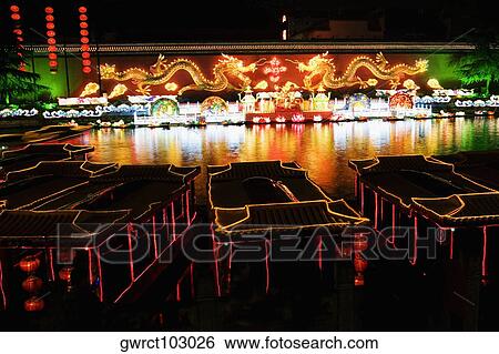Buildings lit up at night, Nanjing, Jiangsu Province, China View Large Photo Image Stock Photograph - Buildings lit up at night, Nanjing, Jiangsu Province, China. Fotosearch