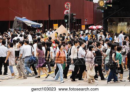 Crowd walking in a street, Hong Kong Island, Hong Kong, China View Large Photo Image Stock Image - Crowd walking in a street, Hong Kong Island, Hong Kong, China. Fotosearch
