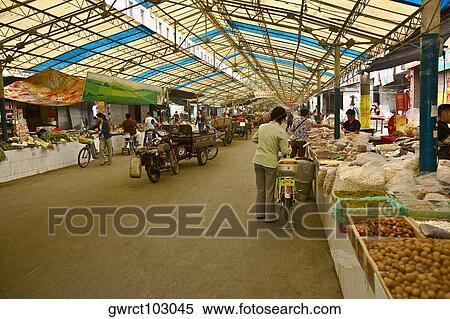 Group of people buying vegetables in market, Tai'an, Shandong Province, China View Large Photo Image Stock Photography - Group of people buying vegetables in market, Tai'an, Shandong Province, China. Fotosearch