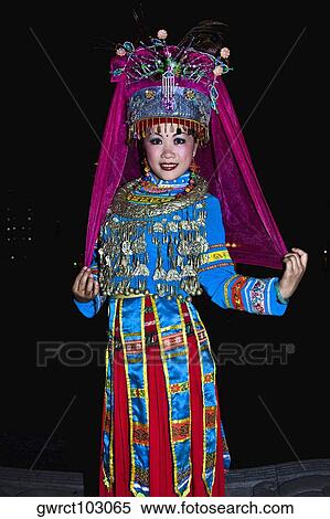Portrait of a young woman smiling, Guilin, Guangxi Province, China View Large Photo Image Stock Photography - Portrait of a young woman smiling, Guilin, Guangxi Province, China. Fotosearch