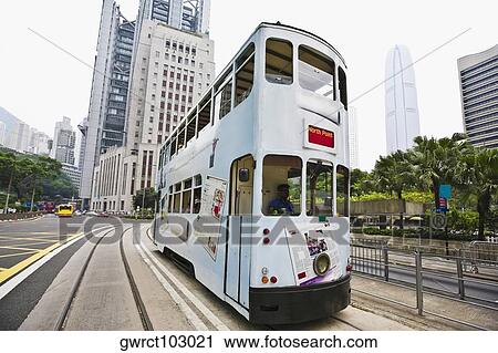 Tram moving on the track, Des Voeux Road, Hong Kong Island, China View Large Photo Image Stock Image - Tram moving on the track, Des Voeux Road, Hong Kong Island, China. Fotosearch