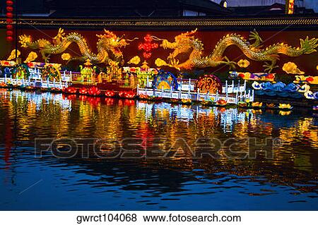 Chinese dragon sculptures lit up at night, Nanjing, Jiangsu Province, China View Large Photo Image Stock Photo - Chinese dragon sculptures lit up at night, Nanjing, Jiangsu Province, China. Fotosearch