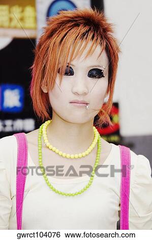 Stock Photograph - Close-up of a young woman, Zhengzhou, Henan Province, China. Fotosearch