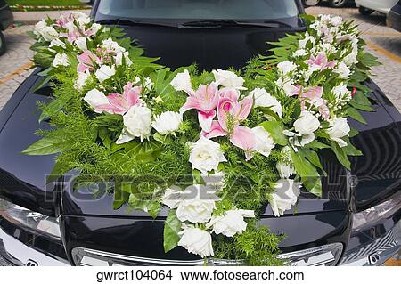 Picture - Close-up of flowers decoration on a car, Qingdao, Shandong Province, China. Fotosearch