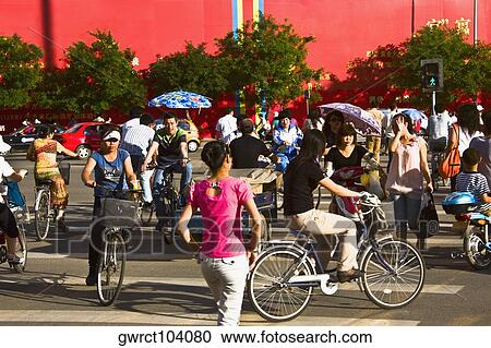 Group of people riding bicycles, HohHot, Inner Mongolia, China View Large Photo Image Stock Image - Group of people riding bicycles, HohHot, Inner Mongolia, China. Fotosearch