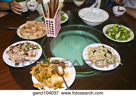High angle view of food served on a table, Beijing, China View Large Photo Image Stock Photo - High angle view of food served on a table, Beijing, China. Fotosearch