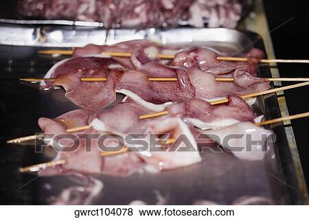 Octopus on skewers, Nanjing, Jiangsu Province, China View Large Photo Image Stock Photo - Octopus on skewers, Nanjing, Jiangsu Province, China. Fotosearch