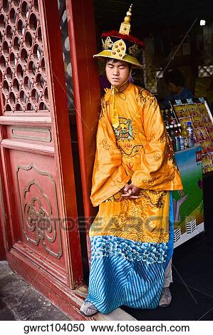Young man napping at the entrance of a shop, Temple of Heaven, Beijing, China View Large Photo Image Stock Image - Young man napping at the entrance of a shop, Temple of Heaven, Beijing, China. Fotosearch