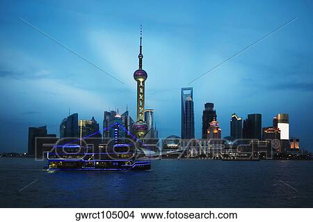 Buildings at the waterfront, Oriental Pearl Tower, Huangpu River, Lujiazui, The Bund, Shanghai, China View Large Photo Image Picture - Buildings at the waterfront, Oriental Pearl Tower, Huangpu River, Lujiazui, The Bund, Shanghai, China. Fotosearch