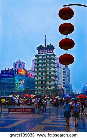 Group of people walking on road, Zhengzhou, Henan Province, China View Large Photo Image Stock Image - Group of people walking on road, Zhengzhou, Henan Province, China. Fotosearch
