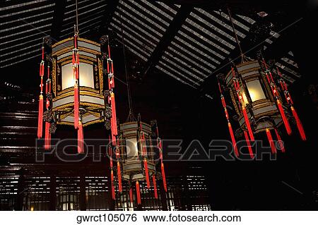 Low angle view of Chinese lanterns lit up in a building, Yu Yuan Gardens, Shanghai, China View Large Photo Image Stock Photograph - Low angle view of Chinese lanterns lit up in a building, Yu Yuan Gardens, Shanghai, China. Fotosearch