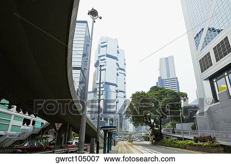 Low angle view of skyscrapers in a city, Des Voeux Road, Hong Kong Island, China View Large Photo Image Stock Photo - Low angle view of skyscrapers in a city, Des Voeux Road, Hong Kong Island, China. Fotosearch