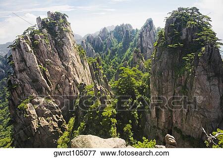 Panoramic view of a mountain range, Huangshan, Anhui province, China View Large Photo Image Stock Photo - Panoramic view of a mountain range, Huangshan, Anhui province, China. Fotosearch