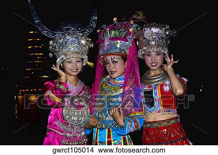 Portrait of two young women and a teenage girl smiling, Guilin, Guangxi Province, China View Large Photo Image Picture - Portrait of two young women and a teenage girl smiling, Guilin, Guangxi Province, China. Fotosearch