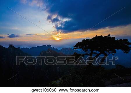 Silhouette of a mountain range at dusk, Huangshan Mountains, Anhui Province, China View Large Photo Image Stock Image - Silhouette of a mountain range at dusk, Huangshan Mountains, Anhui Province, China. Fotosearch