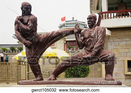 Statues of monks at the entrance of a building, Shaolin Monastery, Henan Province, China View Large Photo Image Stock Image - Statues of monks at the entrance of a building, Shaolin Monastery, Henan Province, China. Fotosearch