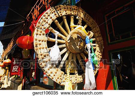 Chinese lanterns and wheel at a market stall, HohHot, Inner Mongolia, China View Large Photo Image Stock Photography - Chinese lanterns and wheel at a market stall, HohHot, Inner Mongolia, China. Fotosearch
