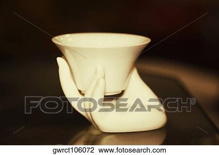 Figurine of a person's hand with a bowl, Hefei, Anhui, China View Large Photo Image Stock Image - Figurine of a person's hand with a bowl, Hefei, Anhui, China. Fotosearch