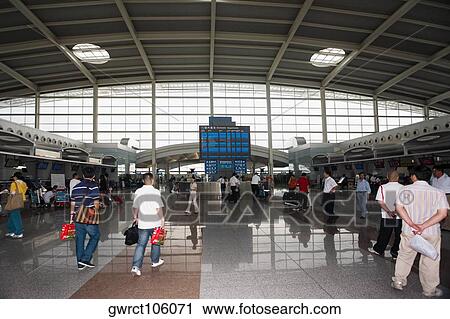 Group of people in a subway station, HohHot, Inner Mongolia, China View Large Photo Image Stock Image - Group of people in a subway station, HohHot, Inner Mongolia, China. Fotosearch