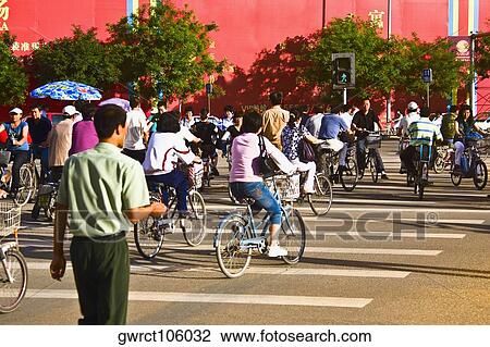 Group of people riding bicycles, HohHot, Inner Mongolia, China View Large Photo Image Stock Image - Group of people riding bicycles, HohHot, Inner Mongolia, China. Fotosearch