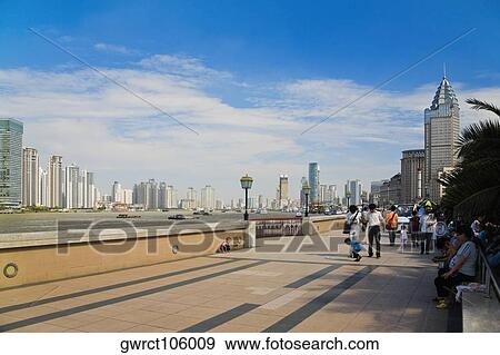 Group of people walking on the road, Lujiazui, The Bund, Shanghai, China View Large Photo Image Stock Photo - Group of people walking on the road, Lujiazui, The Bund, Shanghai, China. Fotosearch