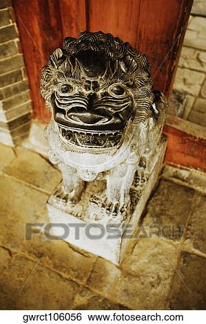High angle view of a statue of a lion, Songyang Academy, Shaolin Monastery, Henan Province, China View Large Photo Image Stock Photograph - High angle view of a statue of a lion, Songyang Academy, Shaolin Monastery, Henan Province, China. Fotosearch