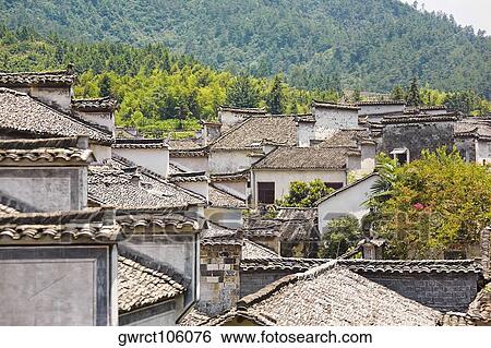 High angle view of houses in a village, Xidi, Anhui Province, China View Large Photo Image Stock Photograph - High angle view of houses in a village, Xidi, Anhui Province, China. Fotosearch