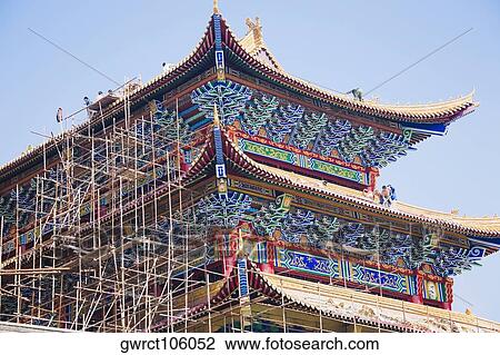 Low angle view of a building under repair, HohHot, Inner Mongolia, China View Large Photo Image Stock Image - Low angle view of a building under repair, HohHot, Inner Mongolia, China. Fotosearch