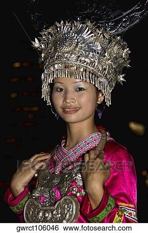 Stock Photograph - Portrait of a teenage girl smiling, Guilin, Guangxi Province, China. Fotosearch