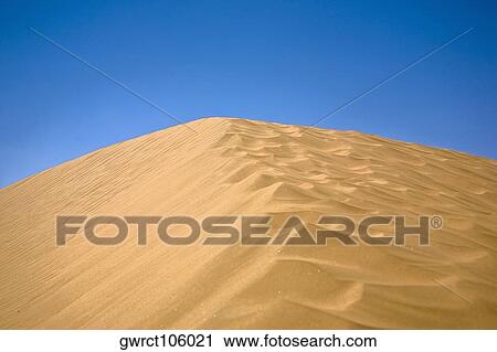 Stock Image - Sand dunes in a desert, Kubuqi Desert, Inner Mongolia, China. Fotosearch