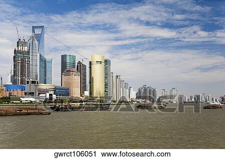 Skyscrapers in a city, Lujiazui, The Bund, Shanghai, China View Large Photo Image Stock Image - Skyscrapers in a city, Lujiazui, The Bund, Shanghai, China. Fotosearch