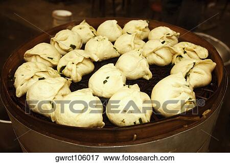 Stream breads on a steamer, Qingdao, Shandong Province, China View Large Photo Image Stock Photo - Stream breads on a steamer, Qingdao, Shandong Province, China. Fotosearch