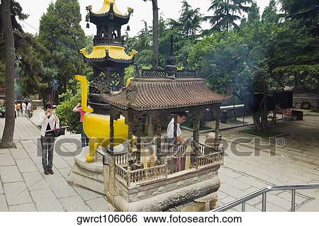 Tourists at a temple, Zhanshan Temple, Qingdao, Shandong Province, China View Large Photo Image Stock Photograph - Tourists at a temple, Zhanshan Temple, Qingdao, Shandong Province, China. Fotosearch