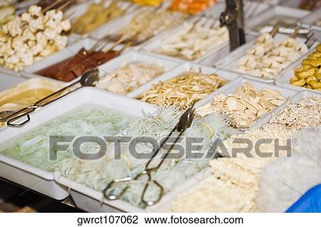 Food at a market stall, Nanjing, Jiangsu Province, China View Large Photo Image Stock Image - Food at a market stall, Nanjing, Jiangsu Province, China. Fotosearch