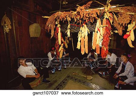Group of people sitting in a house, Yangshuo, Guangxi Province, China View Large Photo Image Stock Photo - Group of people sitting in a house, Yangshuo, Guangxi Province, China. Fotosearch