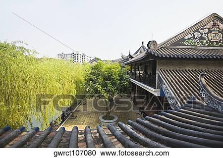 Roof of a building, Yu Yin Shan Fang, Panyu, Guangzhou, Guangdong Province, China View Large Photo Image Stock Image - Roof of a building, Yu Yin Shan Fang, Panyu, Guangzhou, Guangdong Province, China. Fotosearch