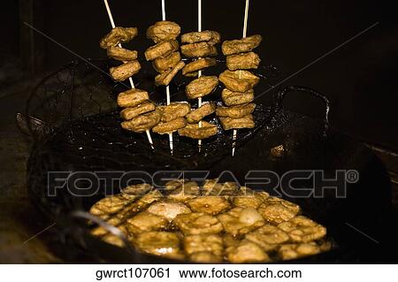 Tofu frying in a pan, Nanjing, Jiangsu Province, China View Large Photo Image Stock Image - Tofu frying in a pan, Nanjing, Jiangsu Province, China. Fotosearch
