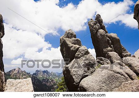 Low angle view of rock formations, Huangshan, Anhui province, China View Large Photo Image Stock Photo - Low angle view of rock formations, Huangshan, Anhui province, China. Fotosearch