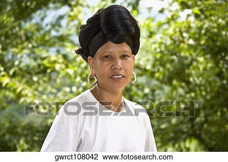 Portrait of a mature woman, Jinkeng Terraced Field, Guangxi Province, China View Large Photo Image Stock Image - Portrait of a mature woman, Jinkeng Terraced Field, Guangxi Province, China. Fotosearch