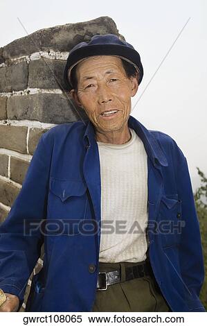 Portrait of a senior man, Great Wall Of China, Beijing, China View Large Photo Image Stock Photography - Portrait of a senior man, Great Wall Of China, Beijing, China. Fotosearch