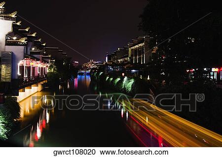 Reflection of buildings in water, Nanjing, Jiangsu Province, China View Large Photo Image Stock Image - Reflection of buildings in water, Nanjing, Jiangsu Province, China. Fotosearch