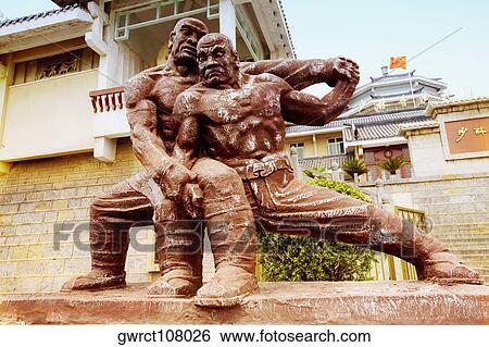 Statues of monks in front of a building, Shaolin Monastery, Henan Province, China View Large Photo Image Stock Photograph - Statues of monks in front of a building, Shaolin Monastery, Henan Province, China. Fotosearch